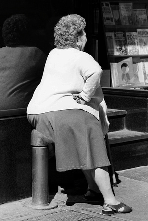 Woman in bus stop